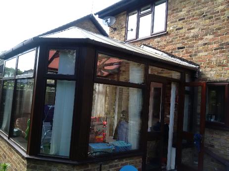 CONVERT OLD CONSERVATORY INTO EXTENSION, TRANSFORM CONSERVATORY roof, install flat felt roof