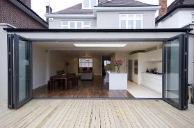 convert your old conservatory into a modern orangery, bifold doors with french doors in the centre, aluminium bifold doors, modern kitchen, orangery extension, orangery kitchen extension